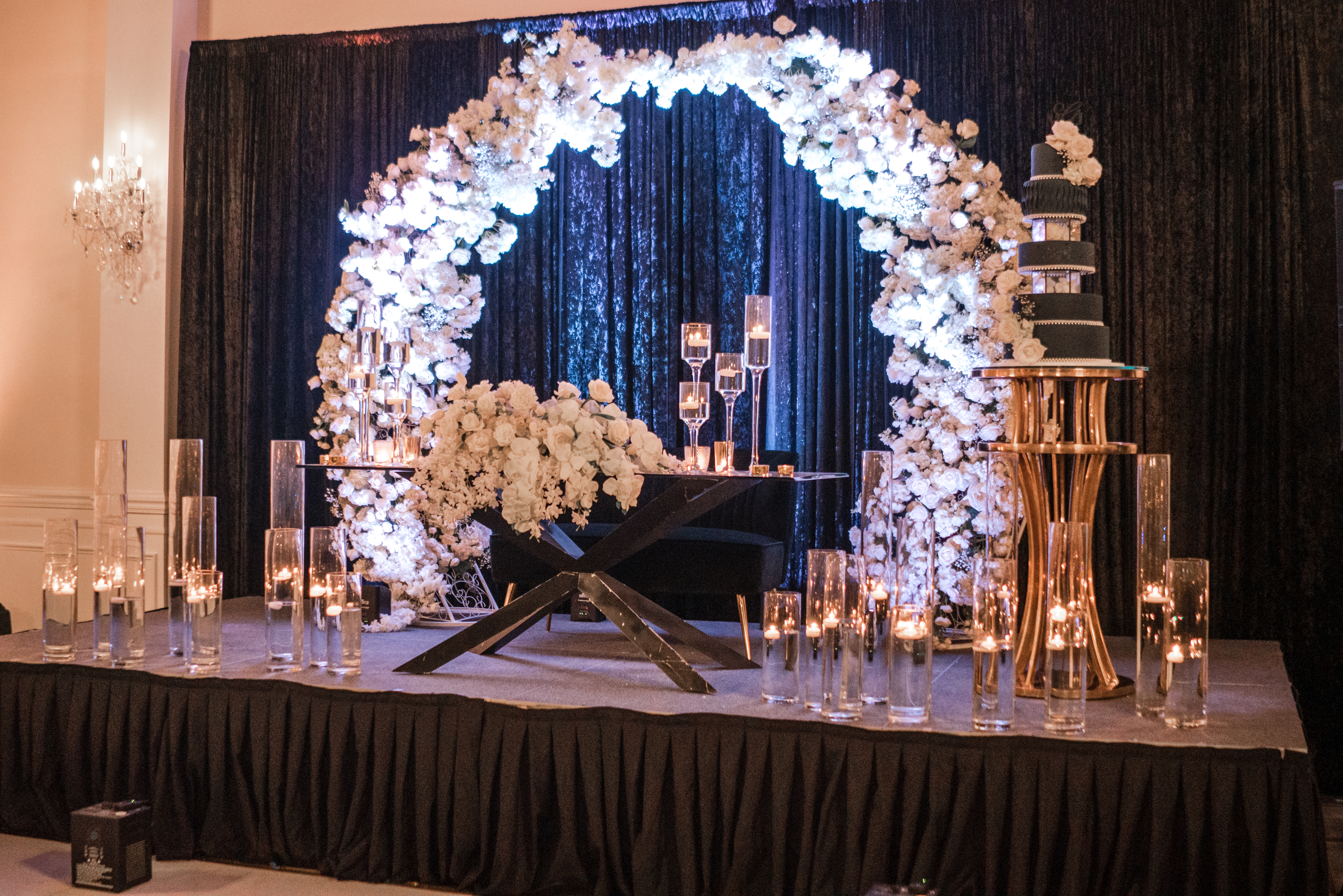 Floral arch and cake display